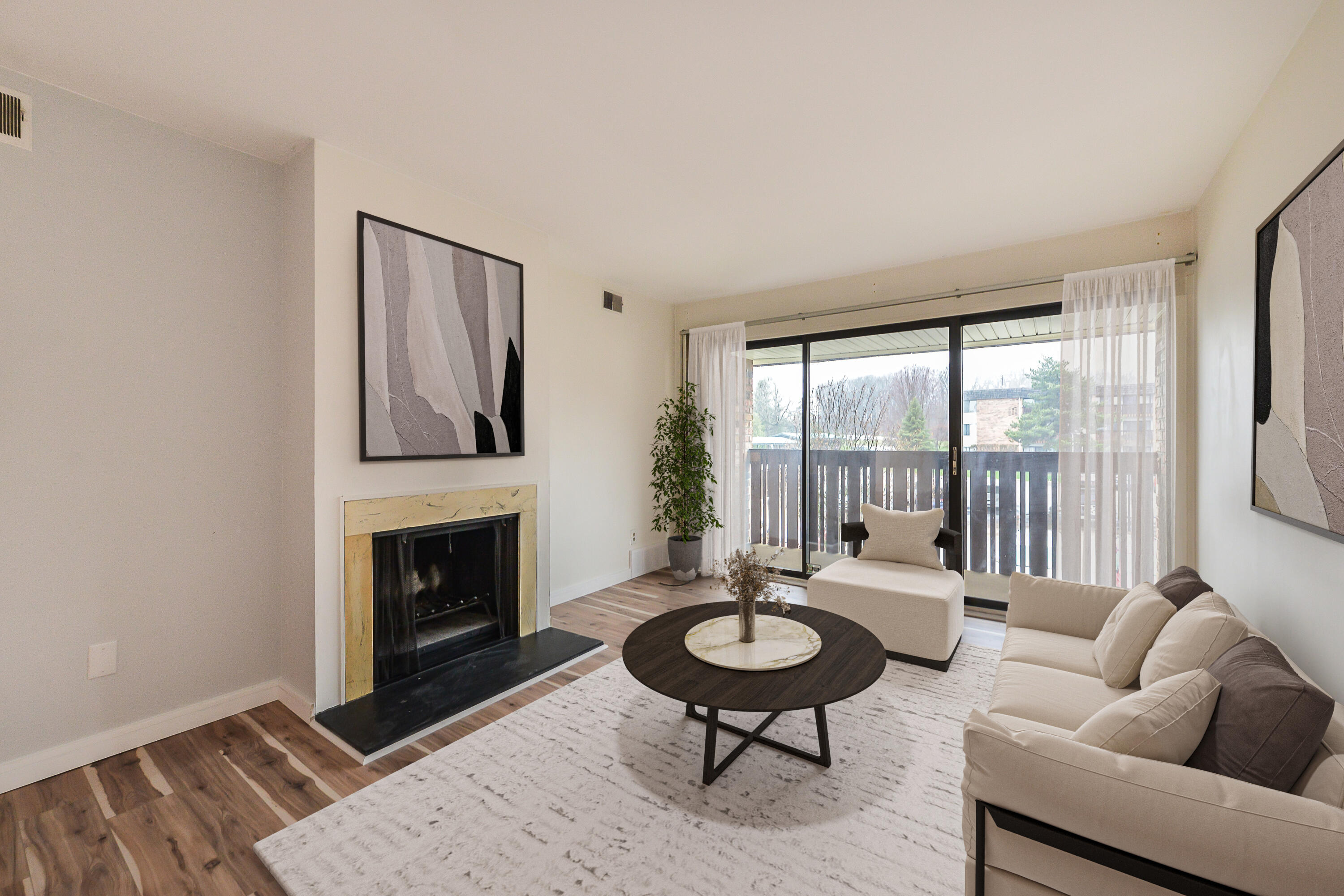 1265 South Maple Road, Unit 305 Ann Arbor, MI 48103 - Photo 2 of 30 Staged Living Room