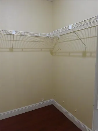 a view of a room with racks on the wall