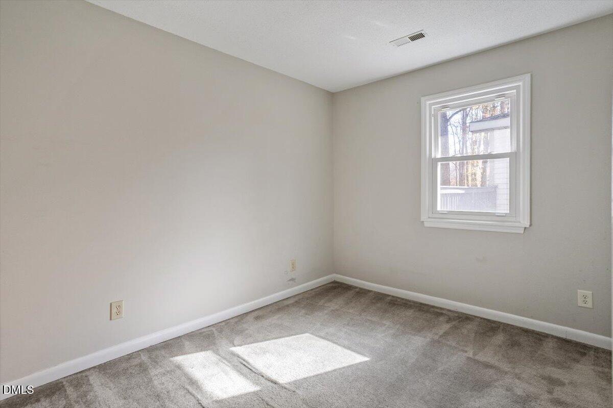 11907 North Roxboro Street Rougemont, NC 27572 - Photo 20 of 37 an empty room with a window