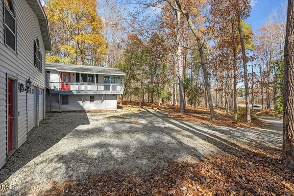a view of empty room with trees
