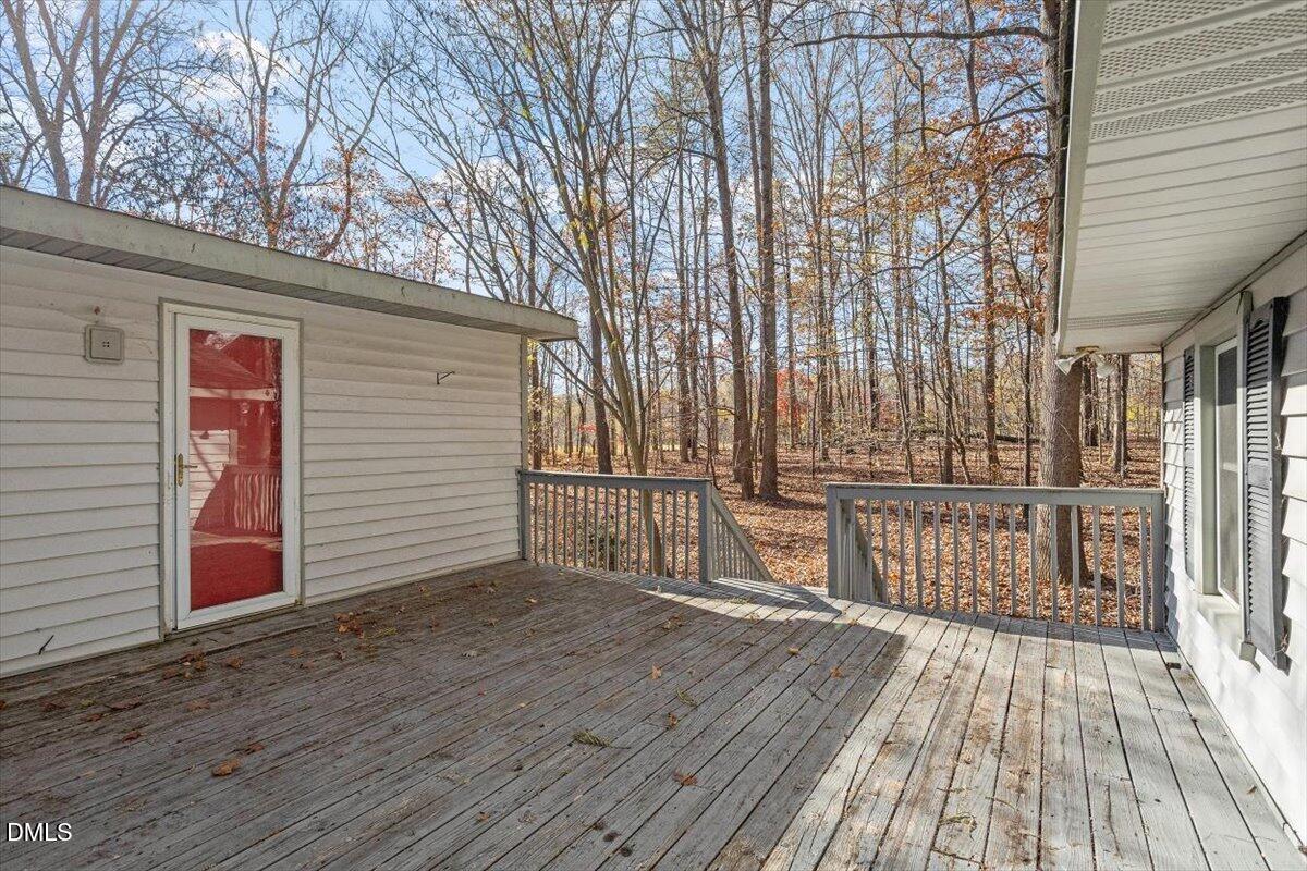 11907 North Roxboro Street Rougemont, NC 27572 - Photo 28 of 37 a view of backyard with a deck