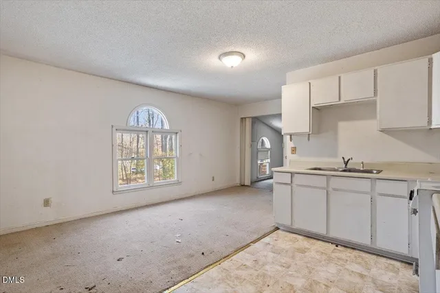 a view of a kitchen with electric appliances