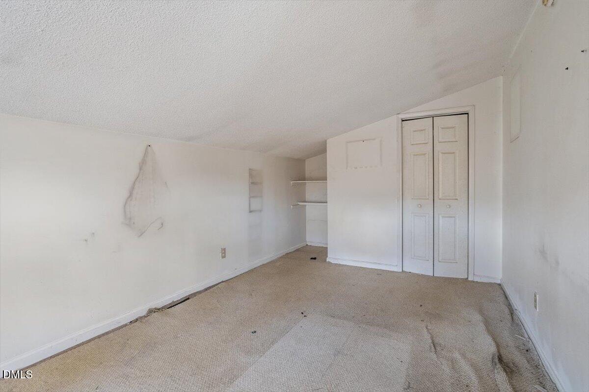 11907 North Roxboro Street Rougemont, NC 27572 - Photo 35 of 37 a view of an empty room