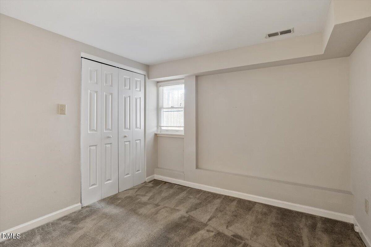 11907 North Roxboro Street Rougemont, NC 27572 - Photo 8 of 37 a view of an empty room