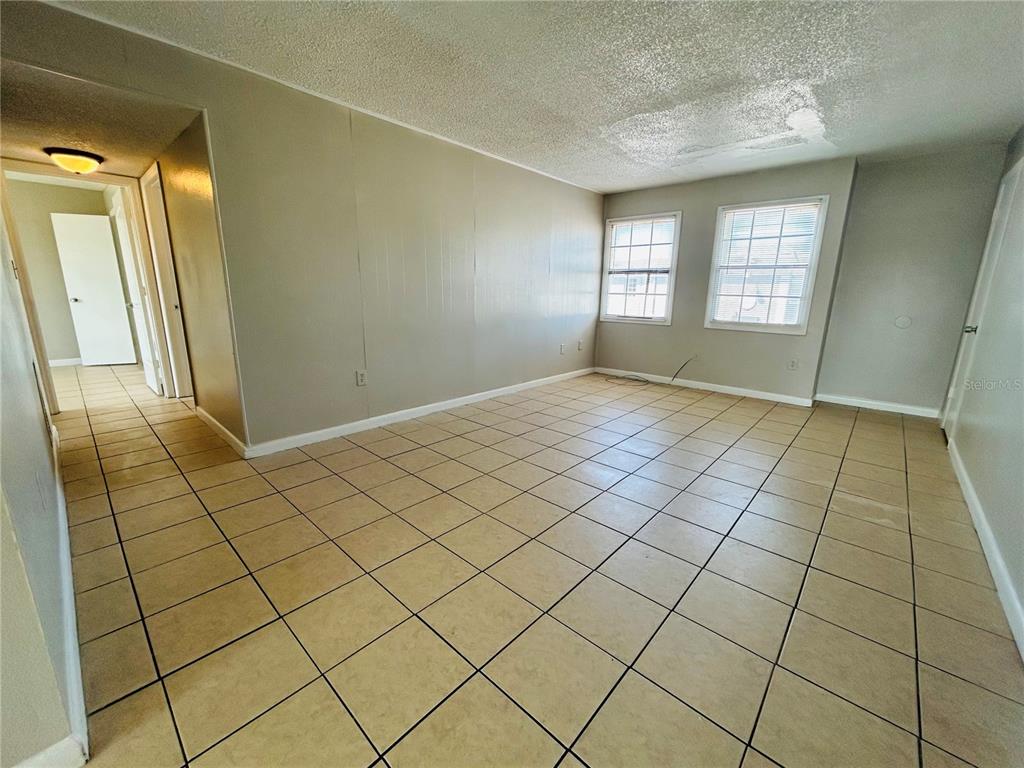 2777 L B McLeod Road, Unit D Orlando, FL 32805 - Photo 2 of 10 a view of an empty room and window