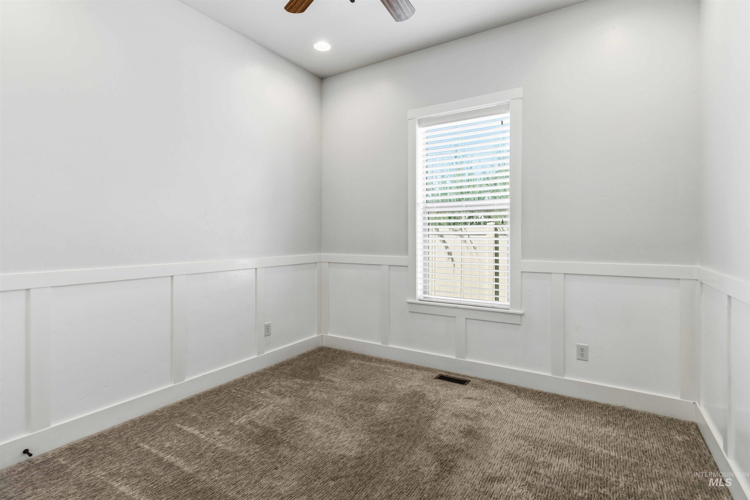 3218 North Cherry Laurel Way Star, ID 83669 - Photo 37 of 50 Entryway featuring wood-finish flooring and a built-in storage bench with upper shelving