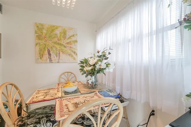 an aerial view of a house with swimming pool garden and patio