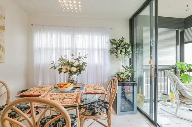 an aerial view of residential houses with yard and swimming pool