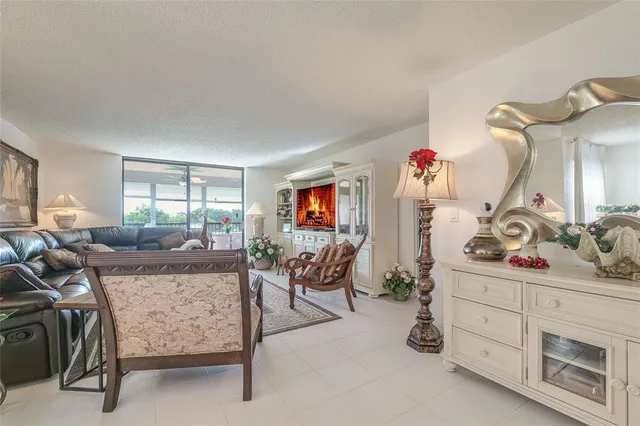 a kitchen with stainless steel appliances a refrigerator and cabinets
