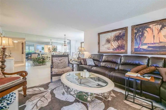 a kitchen with a sink cabinets and stainless steel appliances