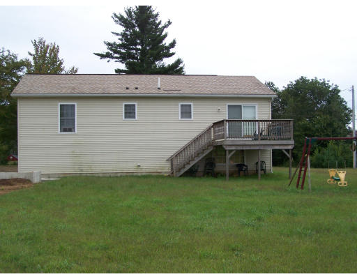 56 Shea Road West Brookfield, MA 01585 - Photo 3 of 6 a view of a house with a backyard
