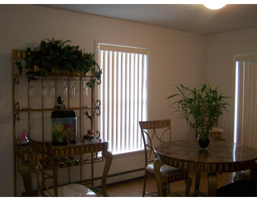 56 Shea Road West Brookfield, MA 01585 - Photo 4 of 6 a living room with furniture and a potted plant