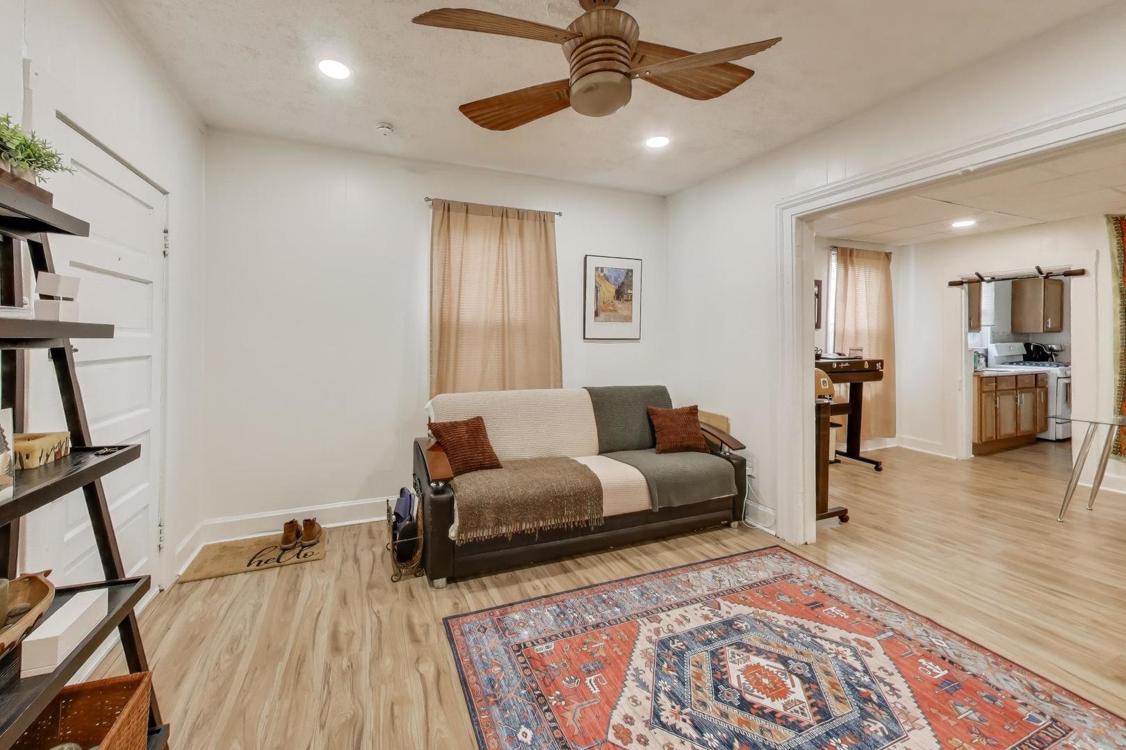 3248 South Paulina Street Chicago, IL 60608 - Photo 5 of 43 a living room with furniture and wooden floor