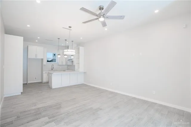 a view of kitchen and windows