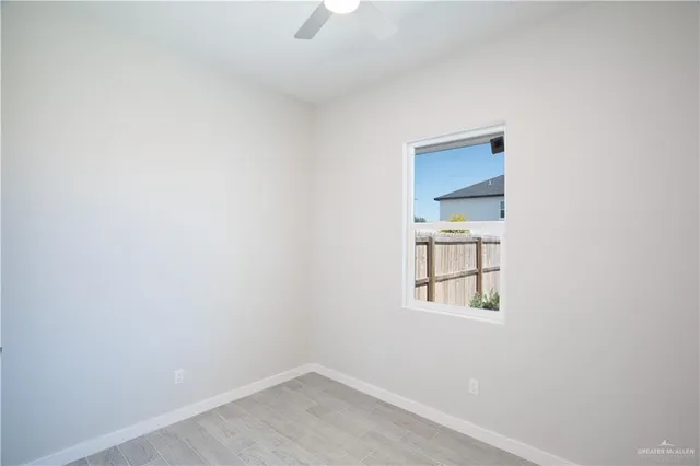 a bathroom with a toilet sink and shower