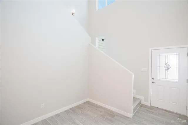 a large room with a lot of kitchen and living room