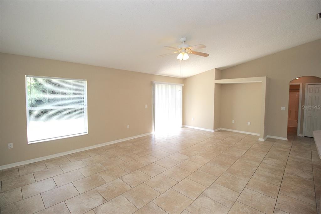 32 Ryding Lane Palm Coast, FL 32164 - Photo 19 of 38 a view of an empty room with a window