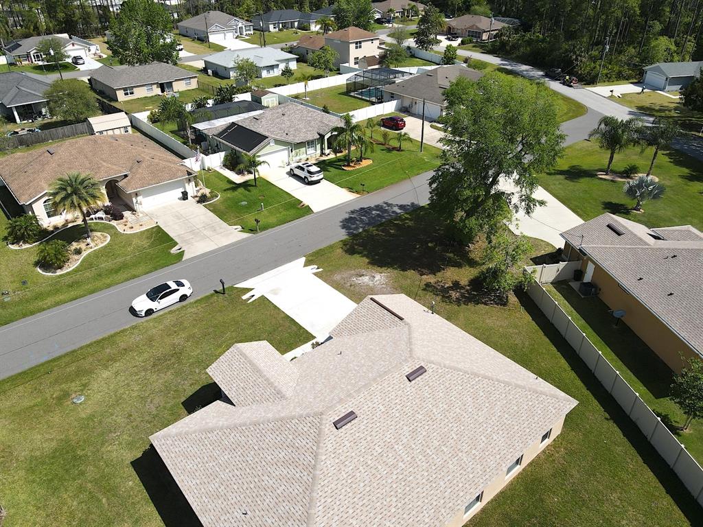 32 Ryding Lane Palm Coast, FL 32164 - Photo 37 of 38 an aerial view of residential houses with outdoor space