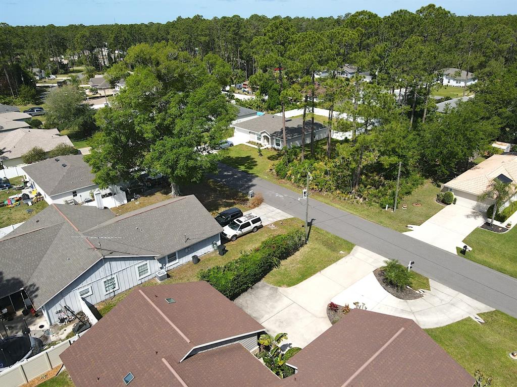 32 Ryding Lane Palm Coast, FL 32164 - Photo 38 of 38 an aerial view of a house with yard