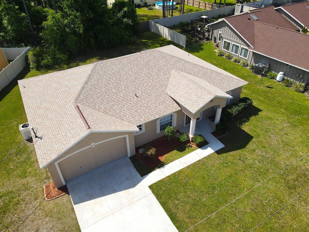 32 Ryding Lane Palm Coast, FL 32164 - Photo 6 of 38 a terrace of a house with outdoor seating