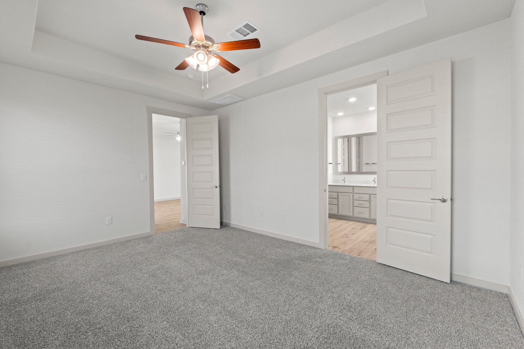 2201 Bobtail Pass Leander, TX 78641 - Photo 19 of 34 a view of an empty room with a ceiling fan