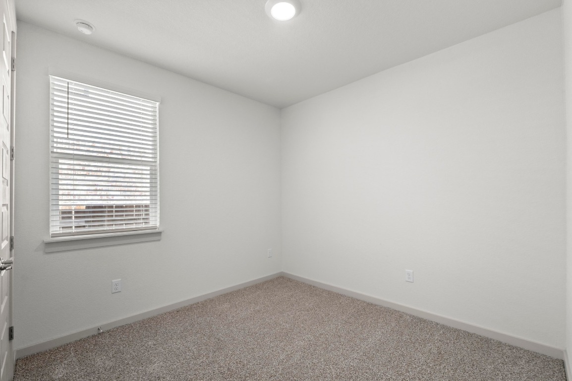 2201 Bobtail Pass Leander, TX 78641 - Photo 20 of 30 an empty room with a window