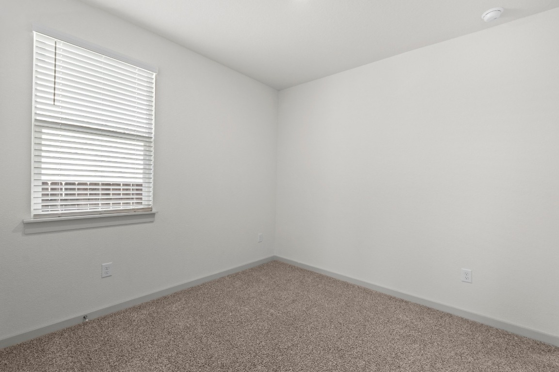 2201 Bobtail Pass Leander, TX 78641 - Photo 24 of 30 an empty room with a window