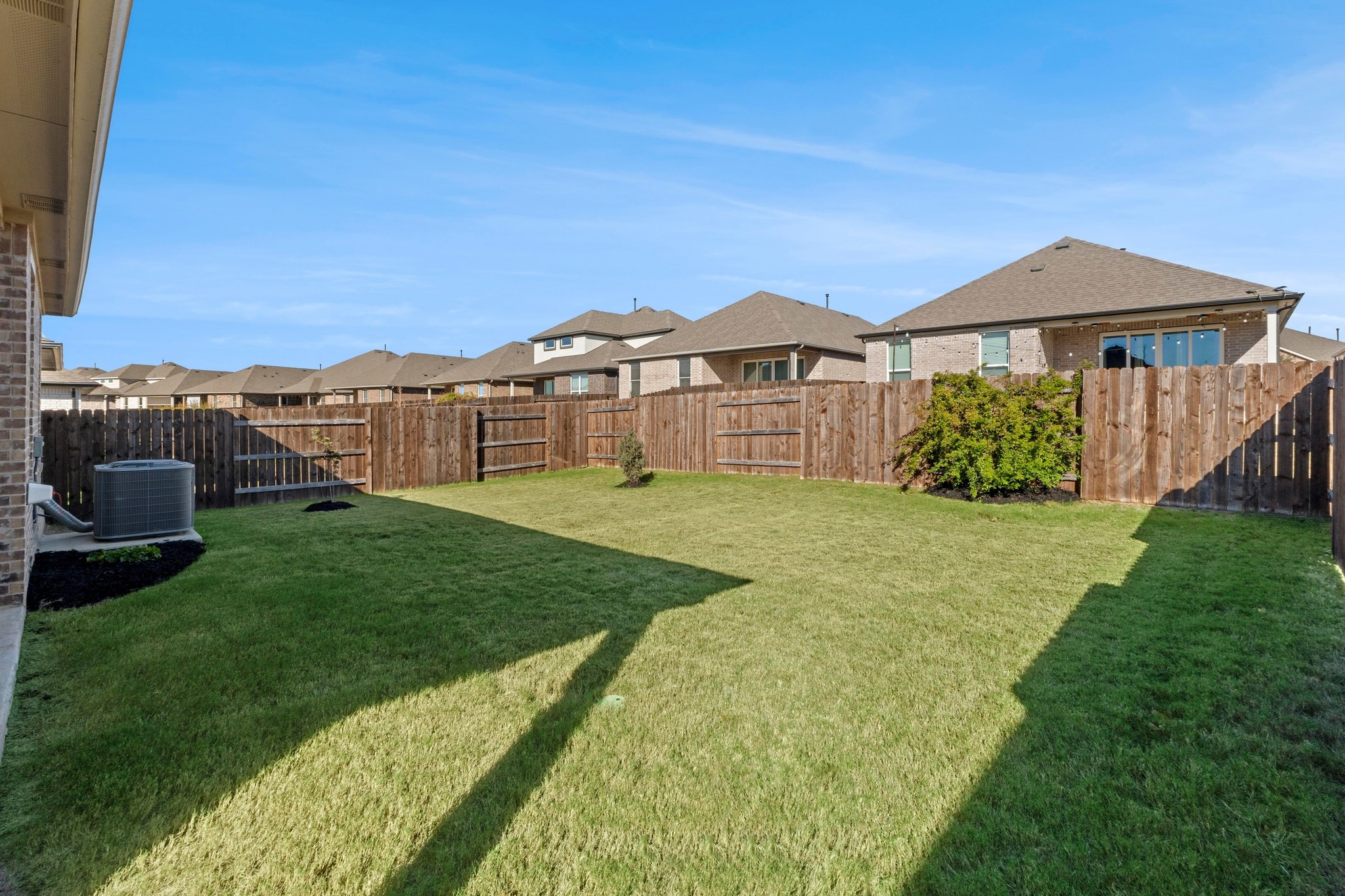 2201 Bobtail Pass Leander, TX 78641 - Photo 31 of 34 a view of a house with a yard