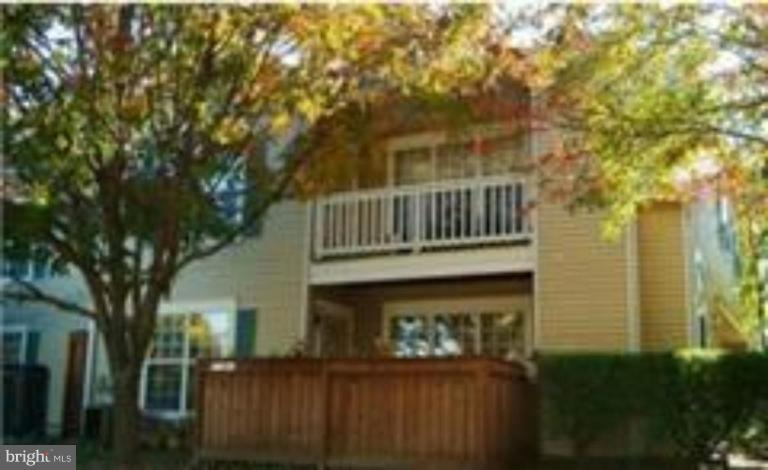 11243 Raging Brook Drive, Unit 247A Bowie, MD 20720 - Photo 1 of 1 a front view of house with yard