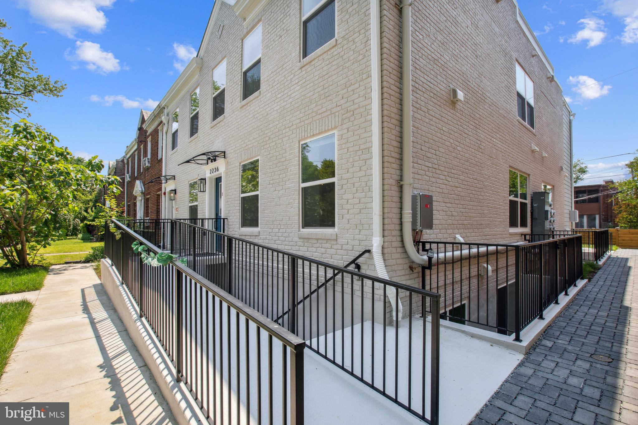 2236 40th Street Northwest, Unit FIVE Washington, DC 20007 - Photo 22 of 37 a view of a balcony with wooden floor