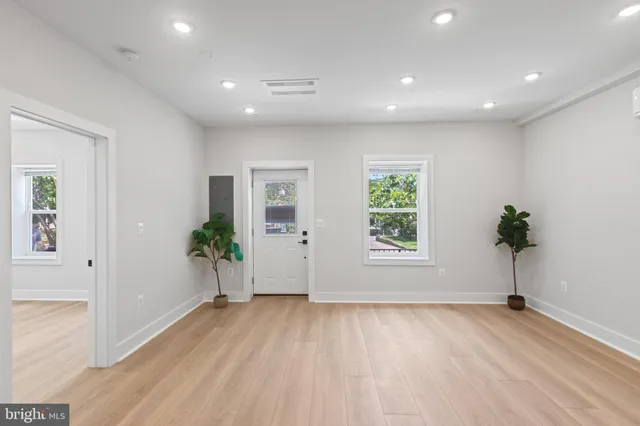 a view of an empty room and window