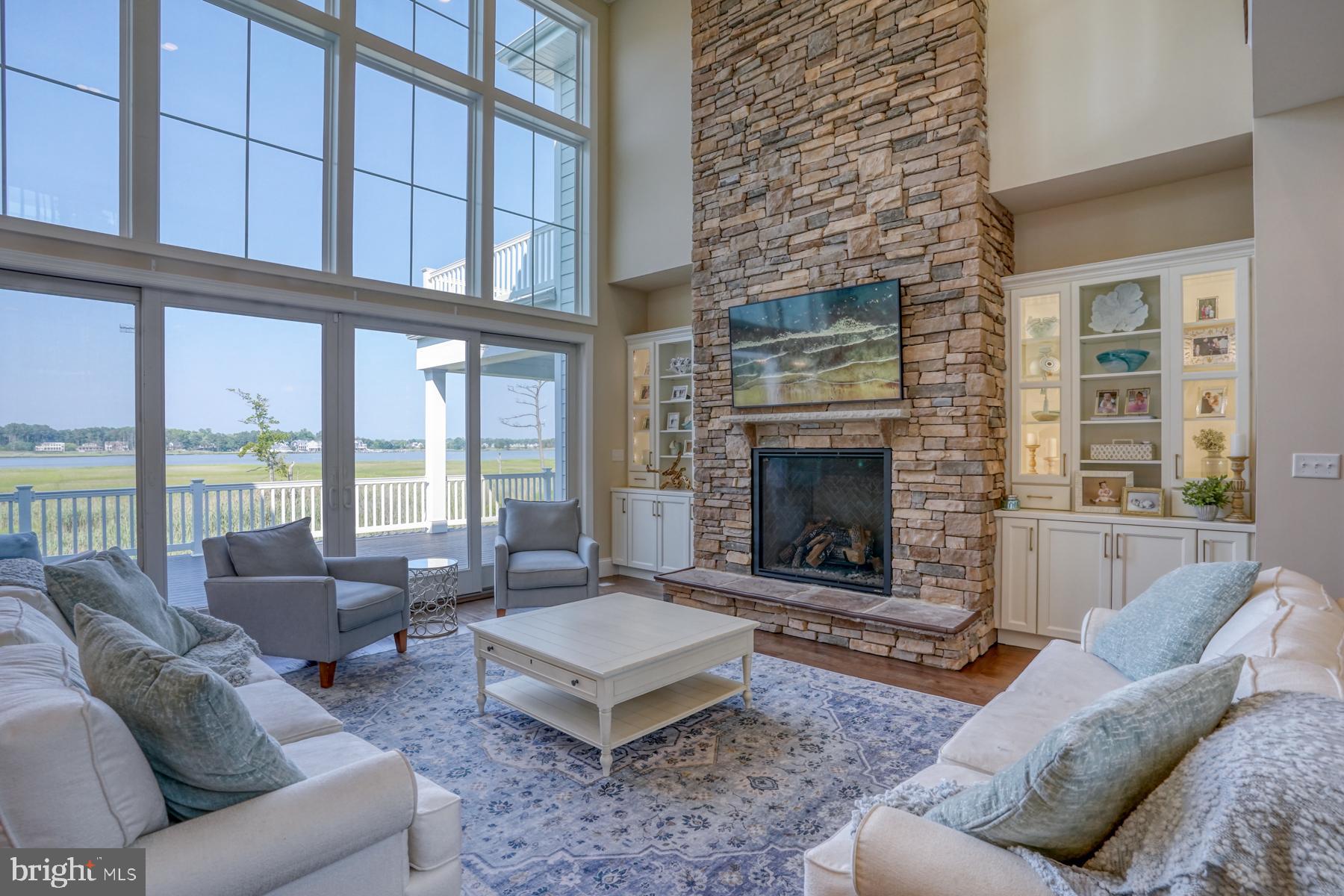 22261 Waterview Road Lewes, DE 19958 - Photo 12 of 93 Two Story Great Room with stone fireplace
