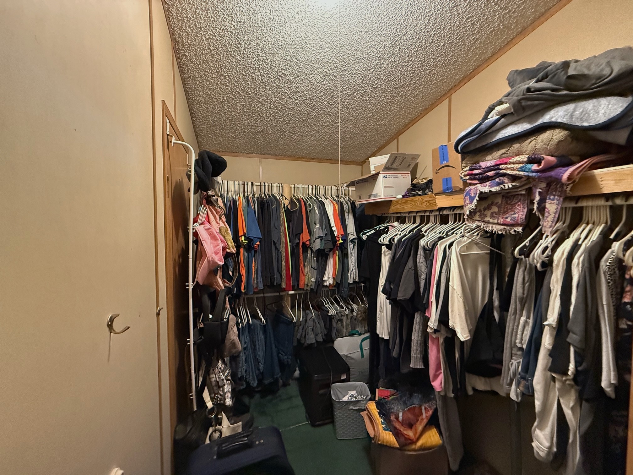 20197 Interstate 45 Buffalo, TX 75831 - Photo 12 of 30 a view of walk in closet with clothes and shoes