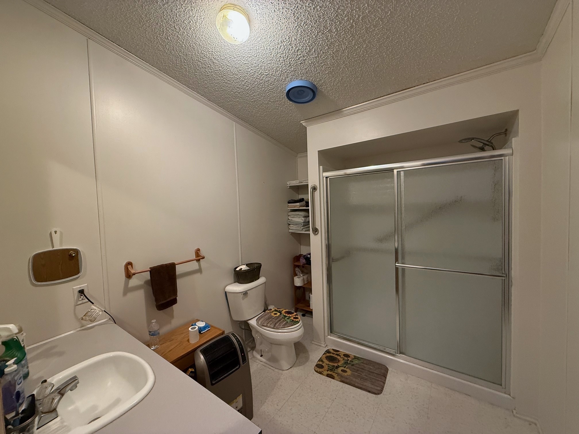 20197 Interstate 45 Buffalo, TX 75831 - Photo 17 of 30 a bathroom with a toilet and a shower