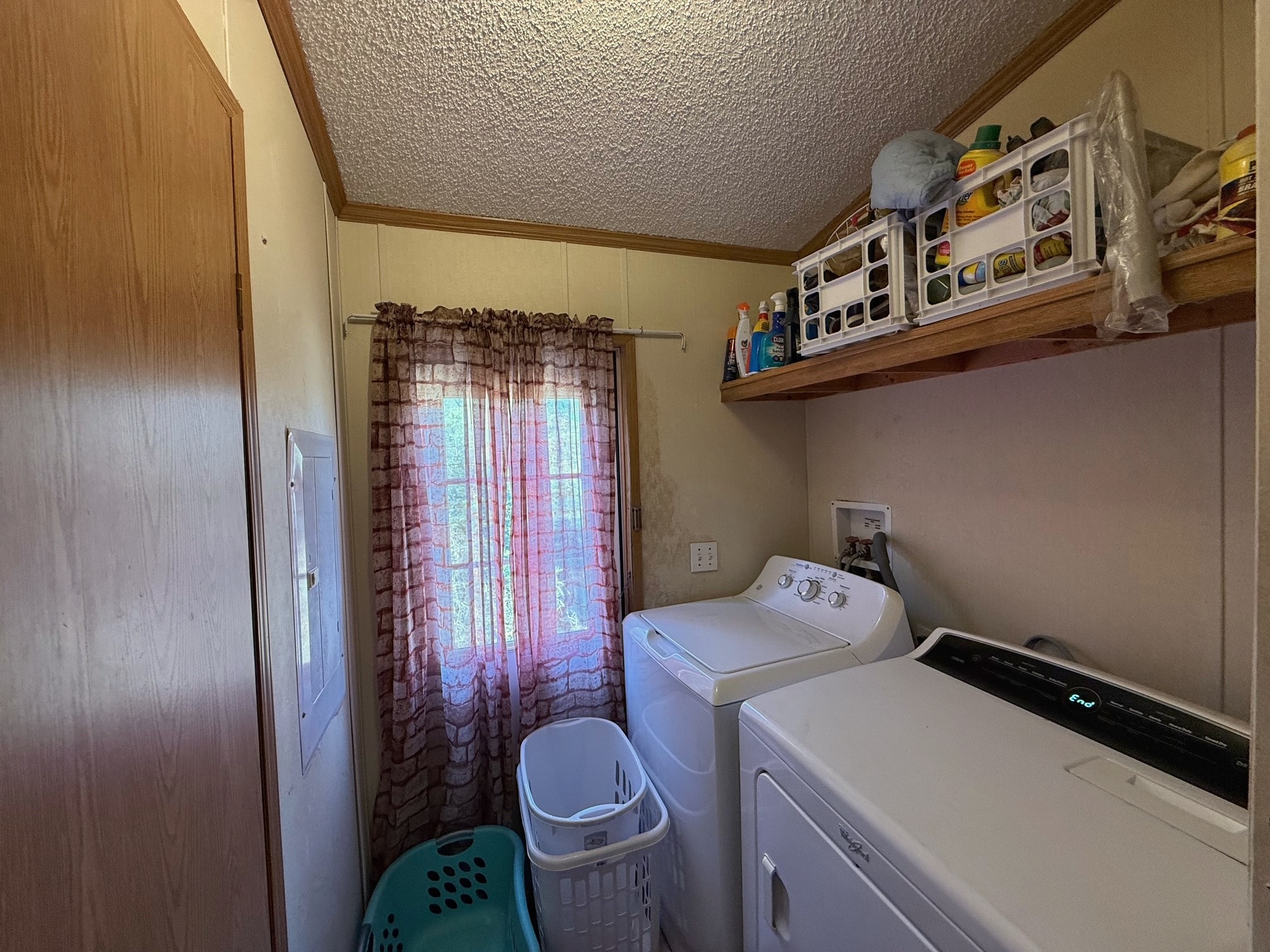 20197 Interstate 45 Buffalo, TX 75831 - Photo 18 of 30 a utility room with dryer and washer