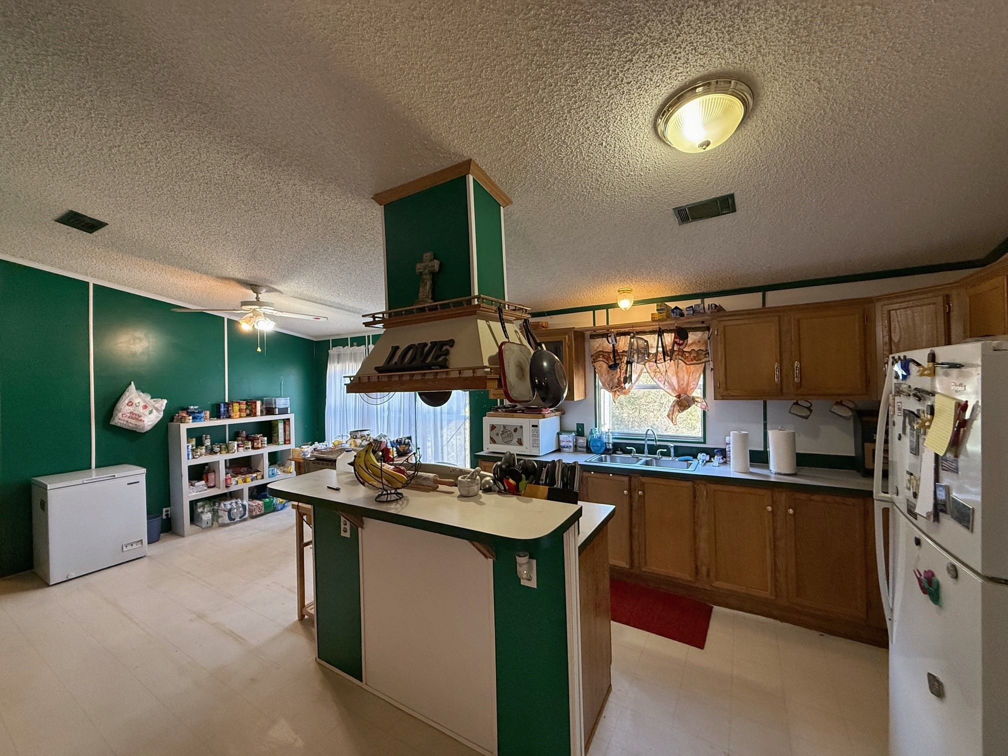 20197 Interstate 45 Buffalo, TX 75831 - Photo 9 of 30 a kitchen with stainless steel appliances granite countertop a sink stove and refrigerator