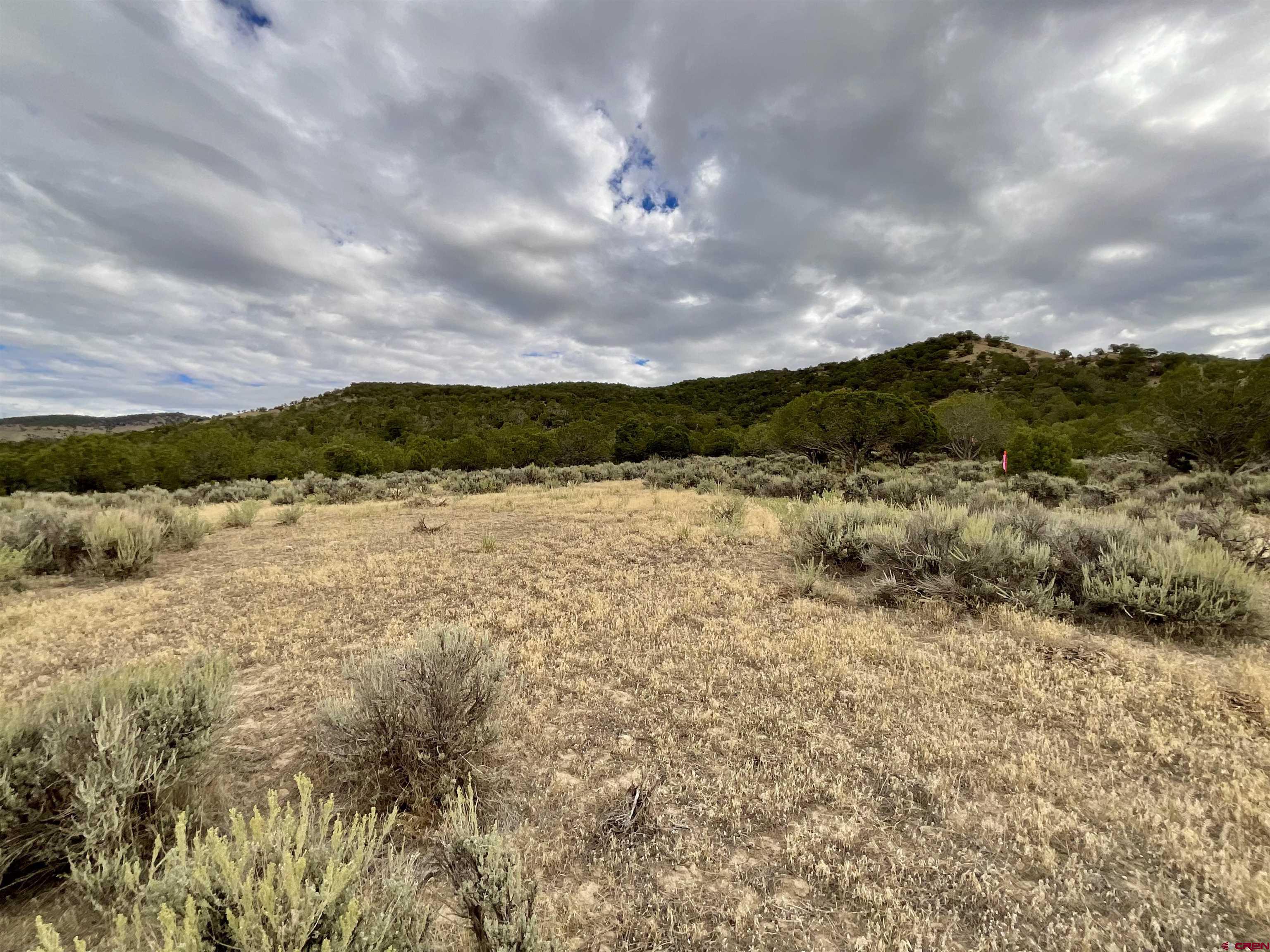 Tbd Lot 22 7250th Road Montrose, CO 81403 - Photo 22 of 25 a view of lake with mountain