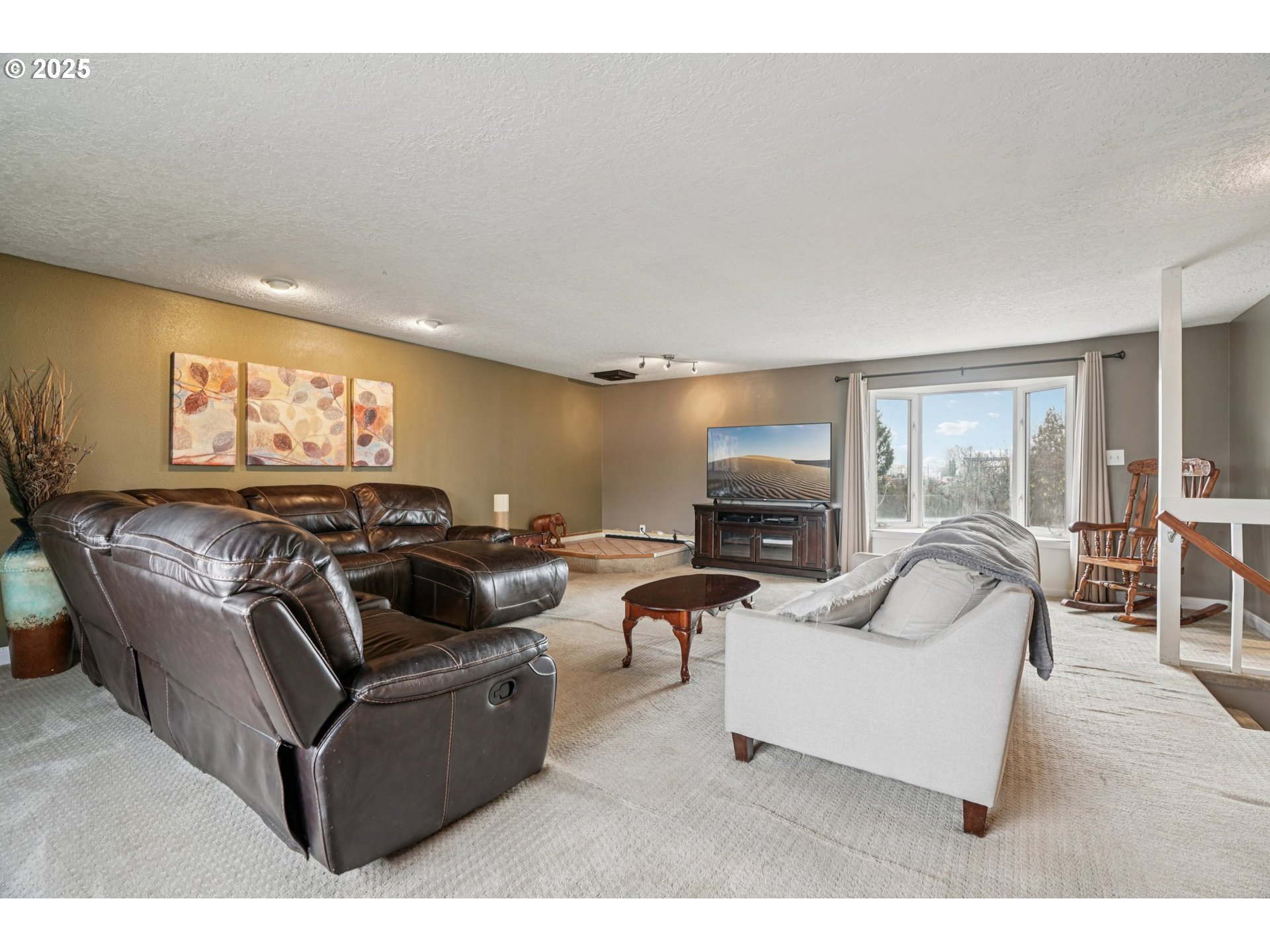 1832 Vine Court Forest Grove, OR 97116 - Photo 11 of 37 a living room with furniture and a fireplace
