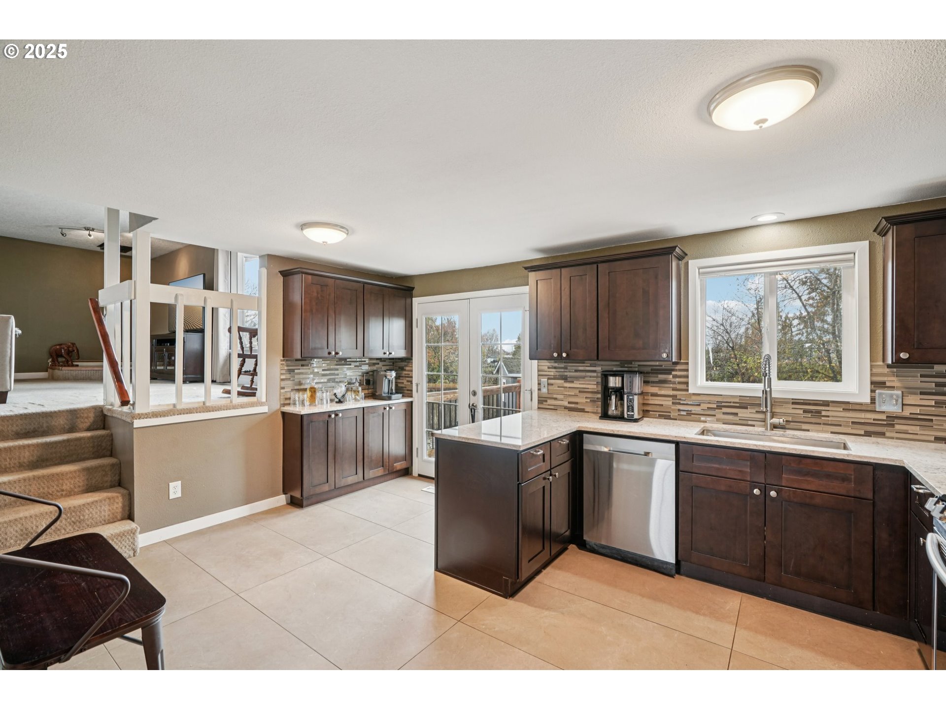1832 Vine Court Forest Grove, OR 97116 - Photo 13 of 37 a kitchen with stainless steel appliances granite countertop a sink and cabinets