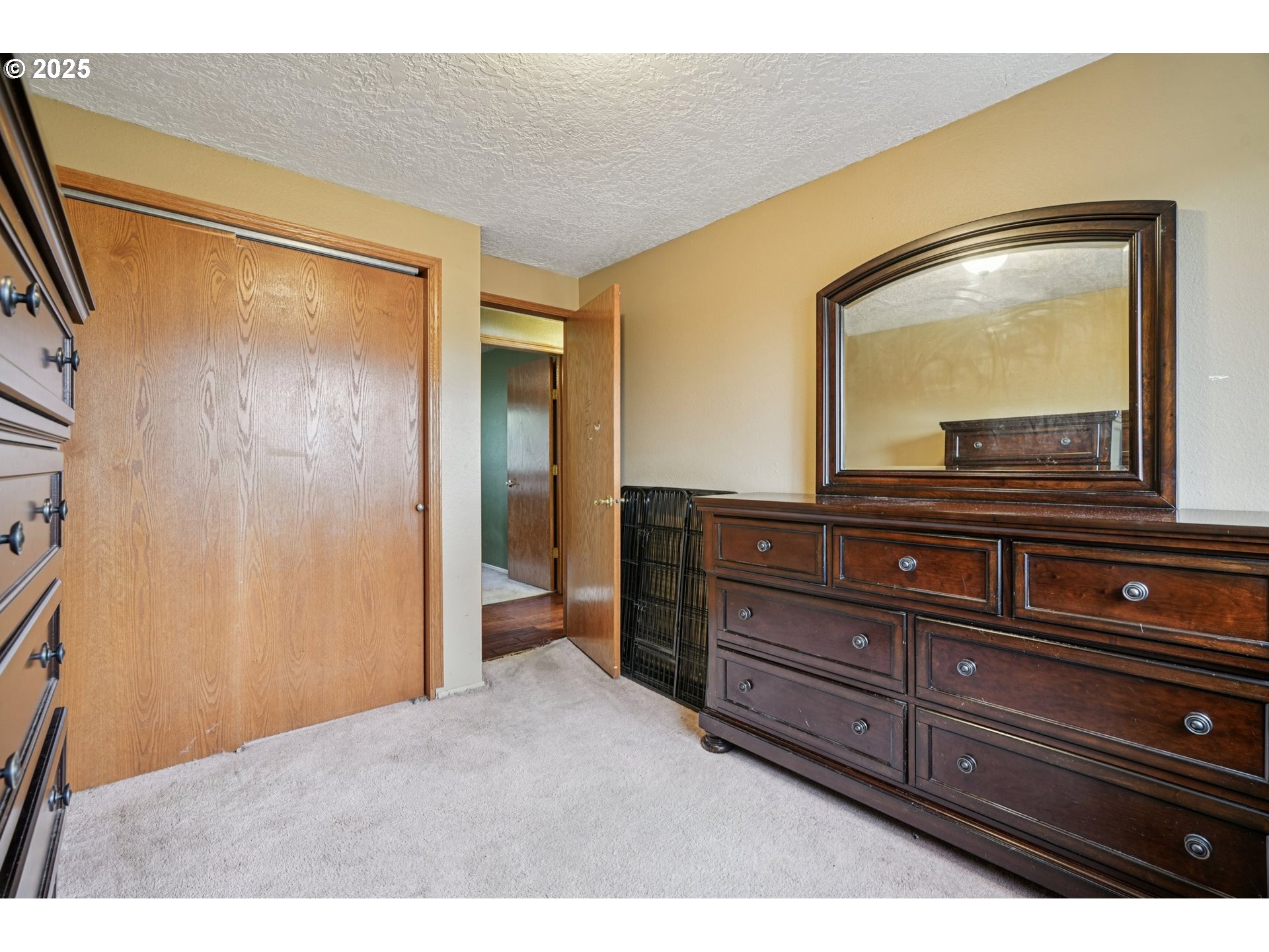 1832 Vine Court Forest Grove, OR 97116 - Photo 23 of 37 a living room with couches and large mirror with painted walls