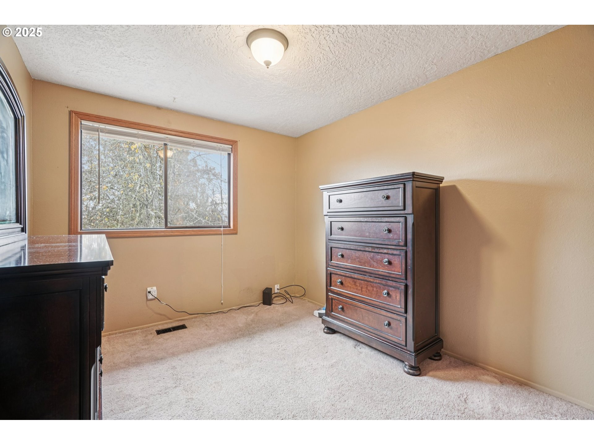 1832 Vine Court Forest Grove, OR 97116 - Photo 24 of 37 a living room with furniture and a window