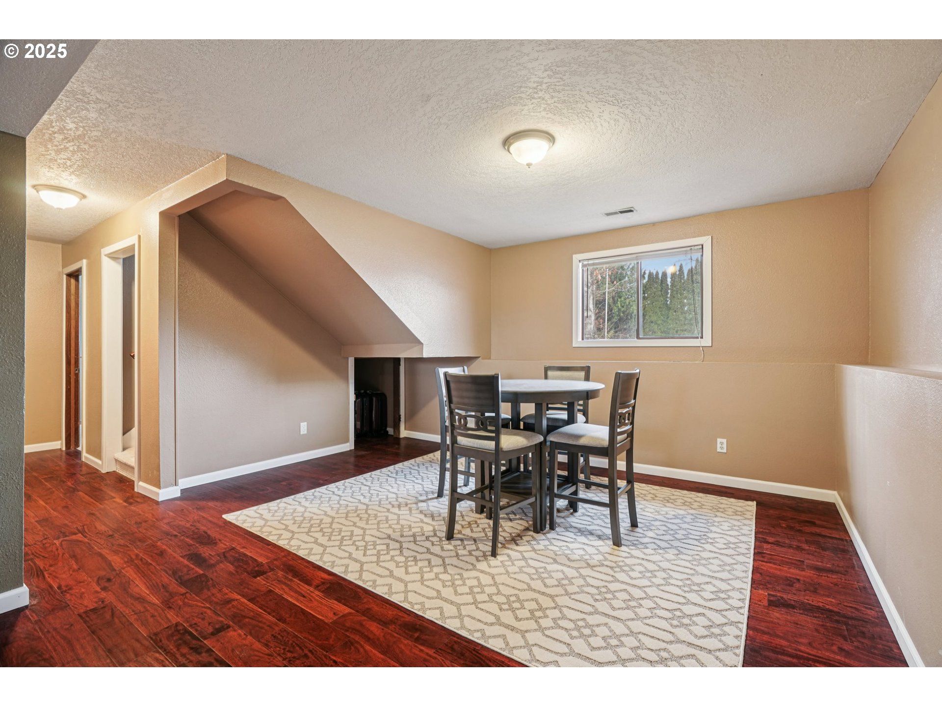 1832 Vine Court Forest Grove, OR 97116 - Photo 25 of 37 a view of a dining room with furniture and wooden floor