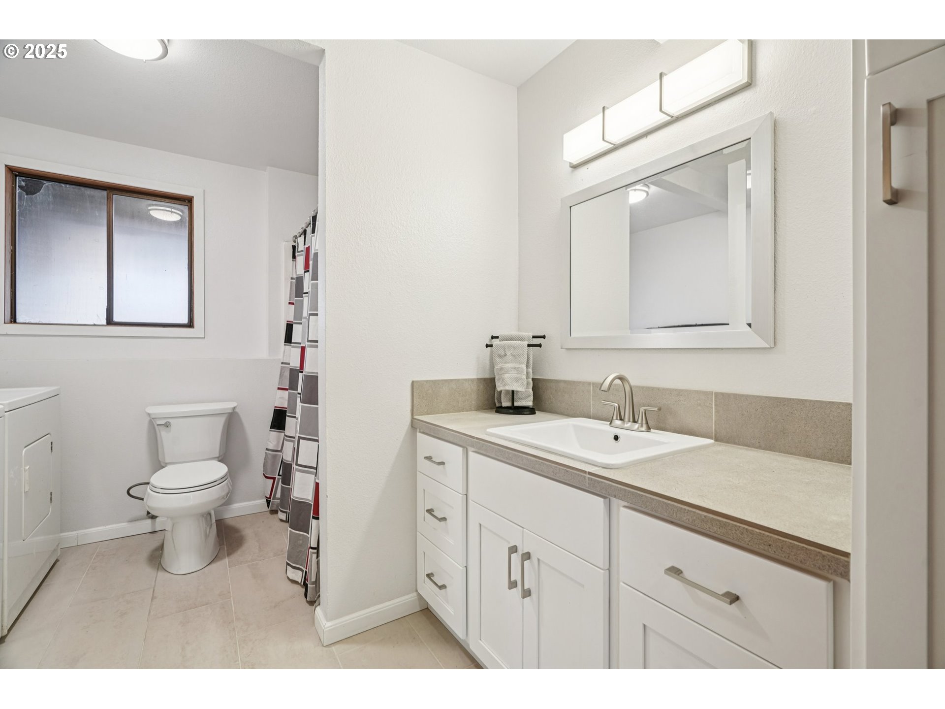 1832 Vine Court Forest Grove, OR 97116 - Photo 30 of 37 a bathroom with a toilet sink and mirror