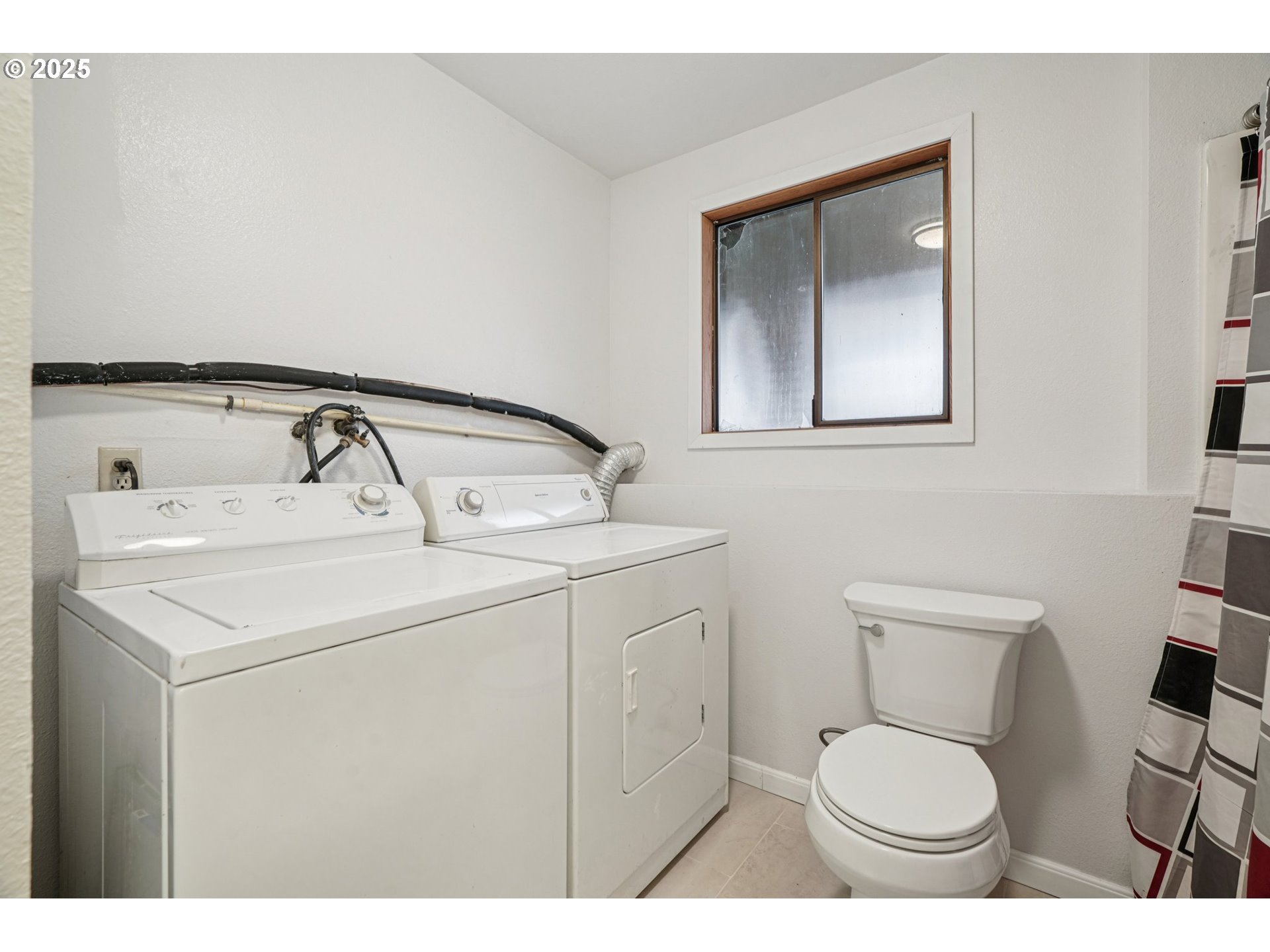 1832 Vine Court Forest Grove, OR 97116 - Photo 32 of 37 a bathroom with a toilet sink and mirror