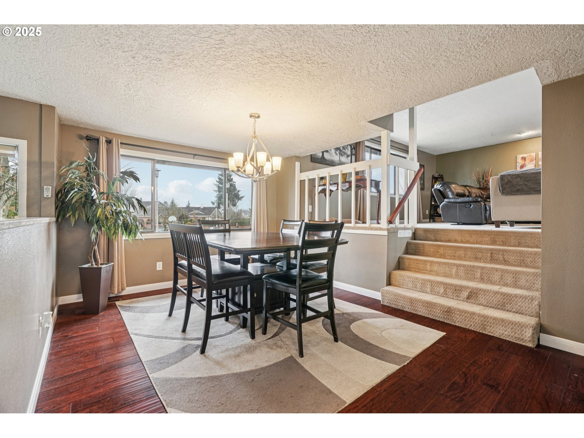 1832 Vine Court Forest Grove, OR 97116 - Photo 8 of 37 a view of a dining room with furniture and wooden floor
