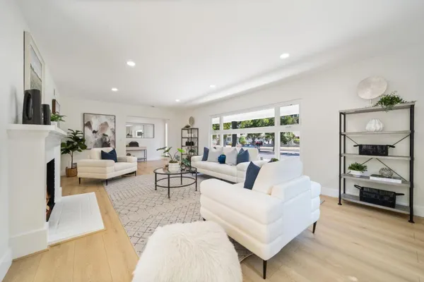 a living room with furniture and a couch