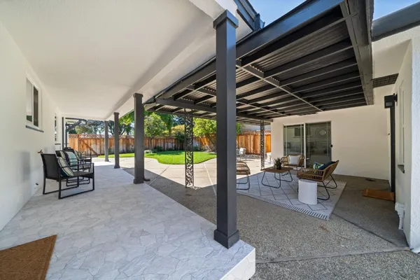 a view of outdoor space with seating area