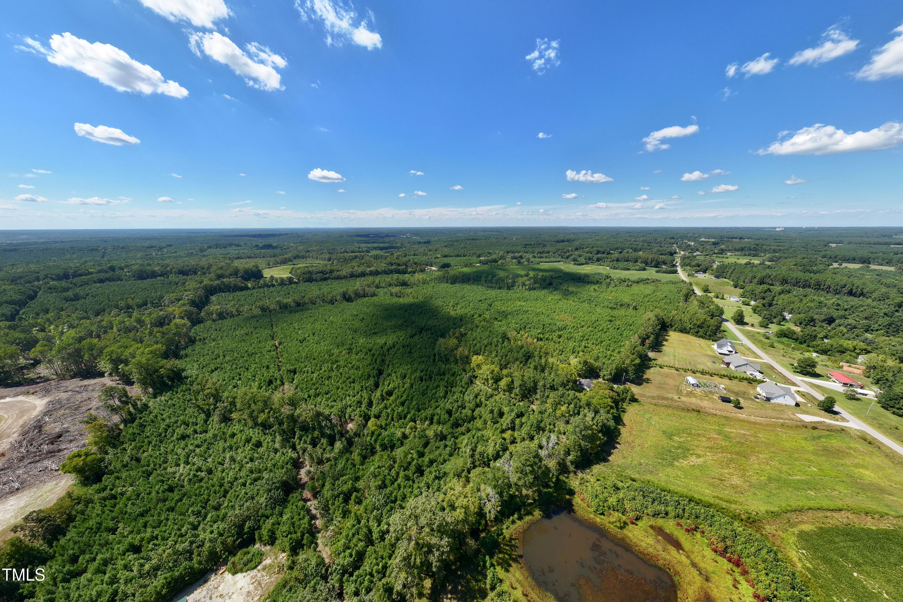 3-4 Walter Grissom Road Kittrell, NC 27544 - Photo 5 of 31 a view of an ocean and a yard