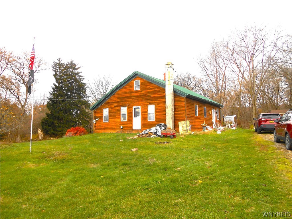 10446 Alexander Road Alexander, NY 14005 - Photo 1 of 1 Front view from north side of yard.