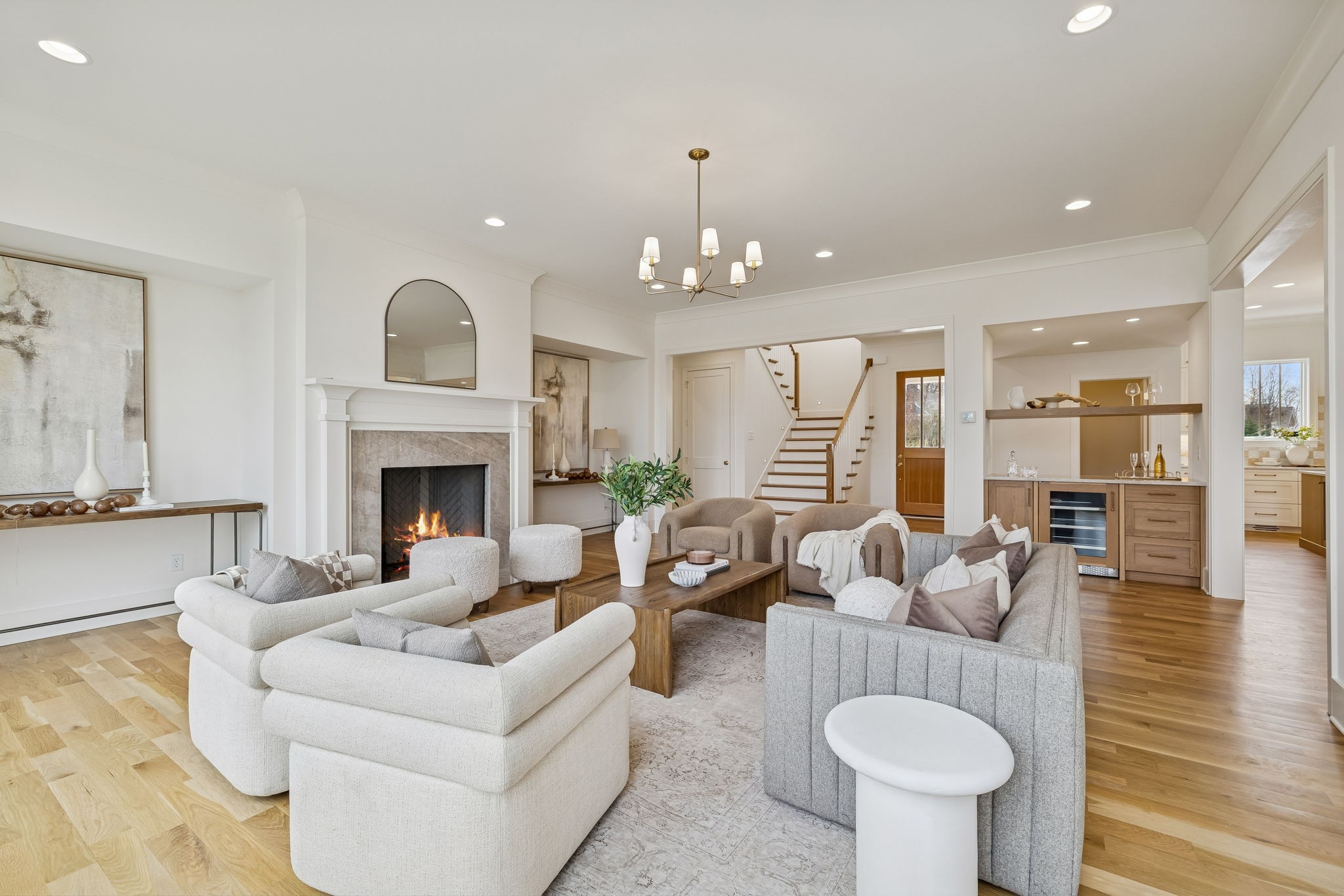 3510 Robin Road Nashville, TN 37204 - Photo 12 of 78 a living room with furniture a fireplace and a chandelier